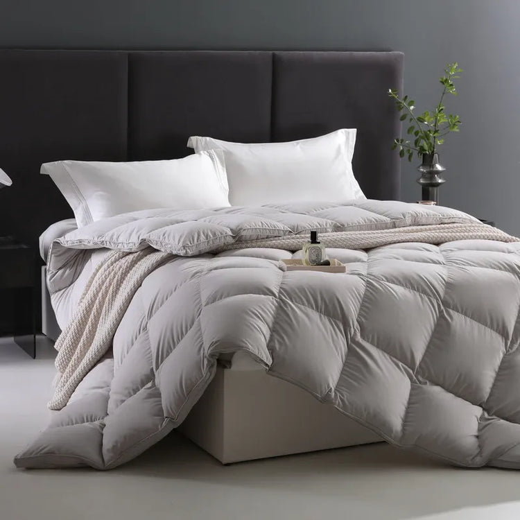 Solid color premium goose down comforter with breathable design, ultra-soft feel, and year-round comfort for Queen and King sizes