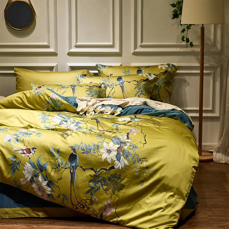 Close-up of duvet from the Imperial Bloom Bedding Set, featuring a beautiful yellow print on one side and a solid green color on the reverse, offering a versatile and stylish look for your bed.