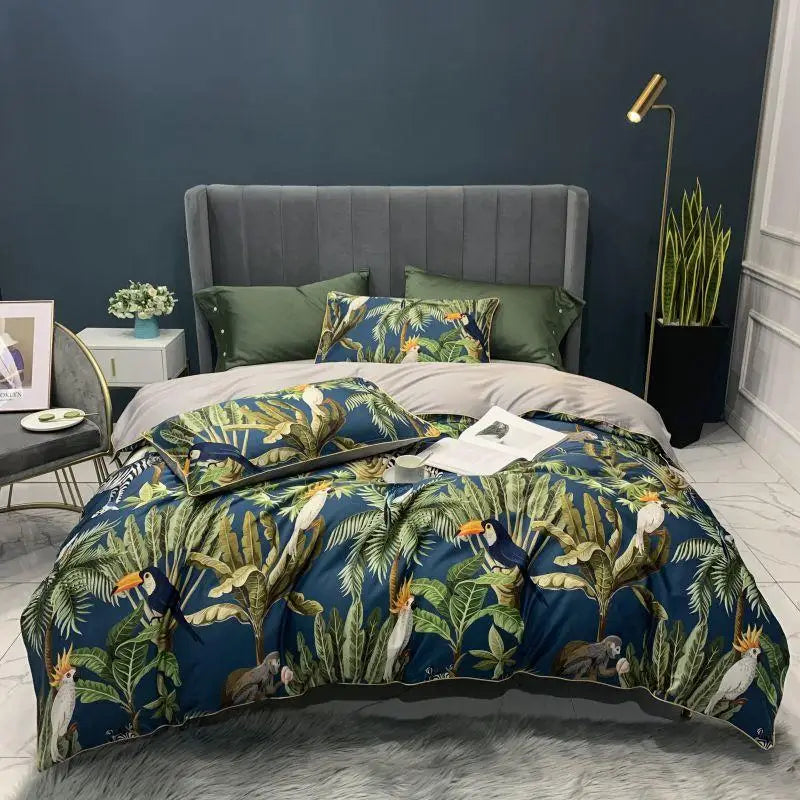 Blue Royal Garden Bedding Set featuring printed exotic birds and leaves, with a luxurious Silky Egyptian Cotton fabric for a soft, breathable, and elegant sleep experience.