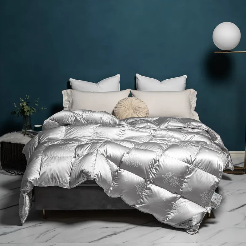 Luxurious goose down comforter with 100% cotton cover, silky jacquard texture, bread shape design, and reversible styling for year-round warmth and comfort