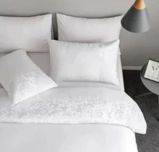 Close-up of Cloud White Velour 3-piece duvet cover and pillowcase set, showcasing ultra-soft velour fabric for silky comfort. Elegant design with cozy texture adds sophistication to your bedroom, creating a perfect sanctuary for relaxation.