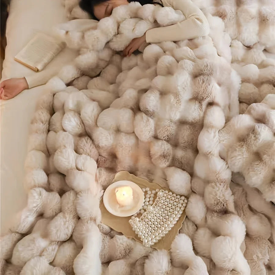 Close-up of Restiva French-Style Faux Fur Tie-Dye Blanket in light beige and white, showcasing the plush texture, with a girl peacefully sleeping underneath, highlighting the luxurious softness and comfort of the blanket.