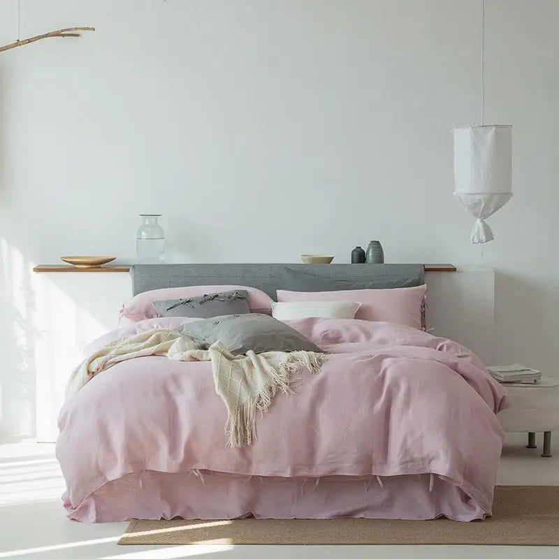 Linené French Linen Bedding Set in Rose Color, elegantly arranged on a neatly made bed, showcasing the duvet cover, pillowcases, and soft linen texture.