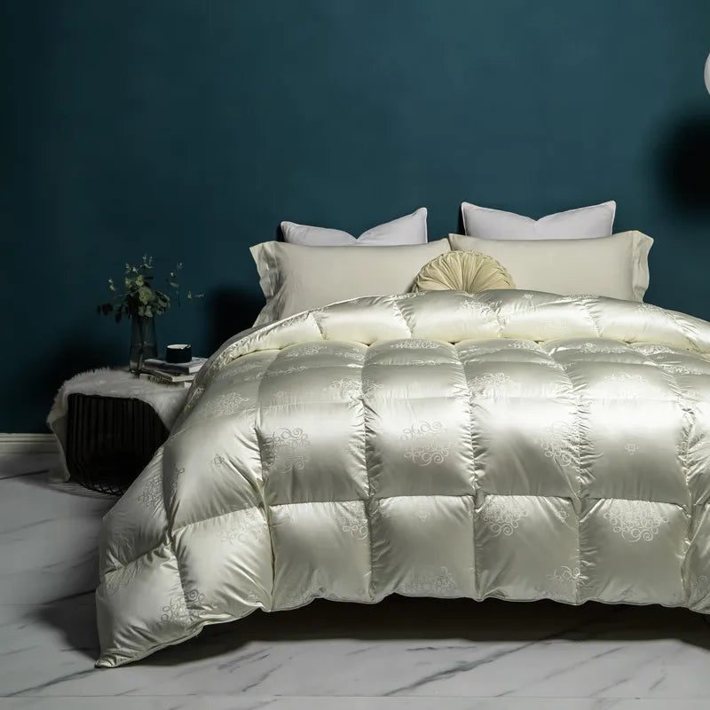 Luxurious goose down comforter with 100% cotton cover, silky jacquard texture, bread shape design, and reversible styling for year-round comfort