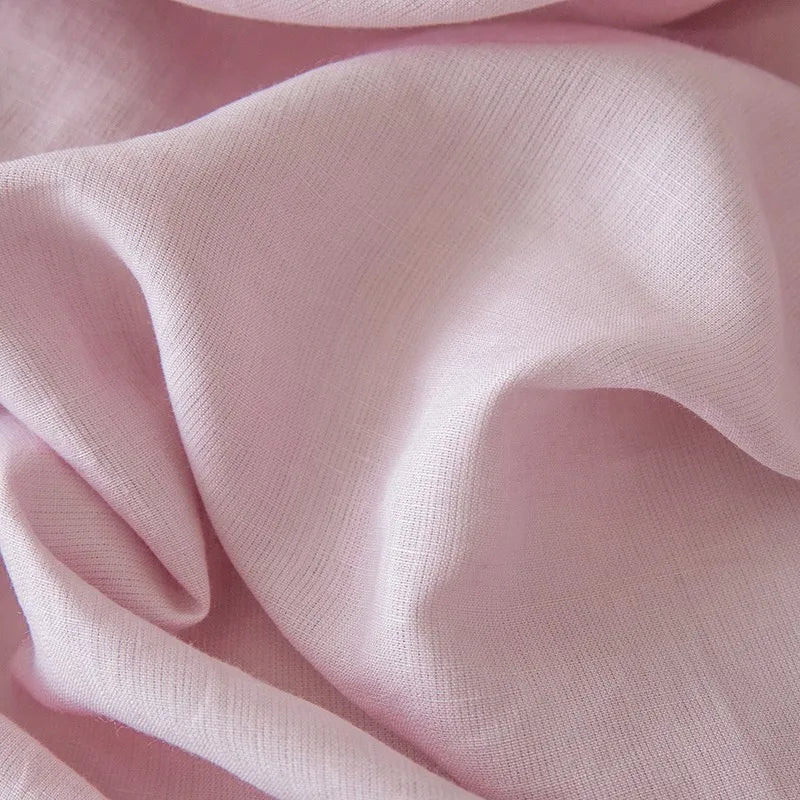 Close-up of Linené French Linen fabric in Rose Color, showcasing the soft texture, delicate weave, and premium quality of the linen.