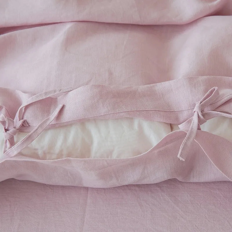 Close-up of Linené French Linen Pillowcase in Rose Color, focusing on the pillow closing detail with fine stitching and the soft, premium linen texture.